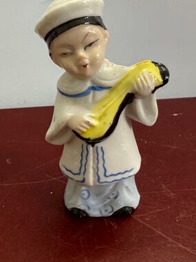 Charming Ceramic Figurine with Yellow and Black Accents-occupied, Japan